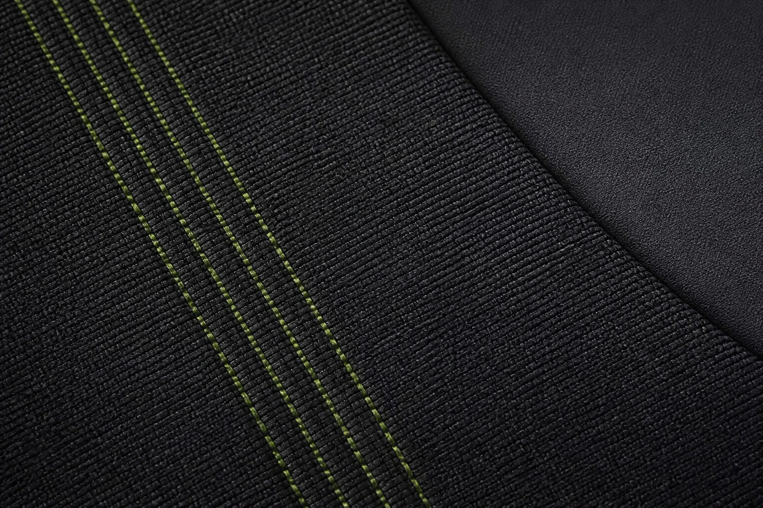 Macro del tejido de la tapicería del EV6 mostrando su trama textil